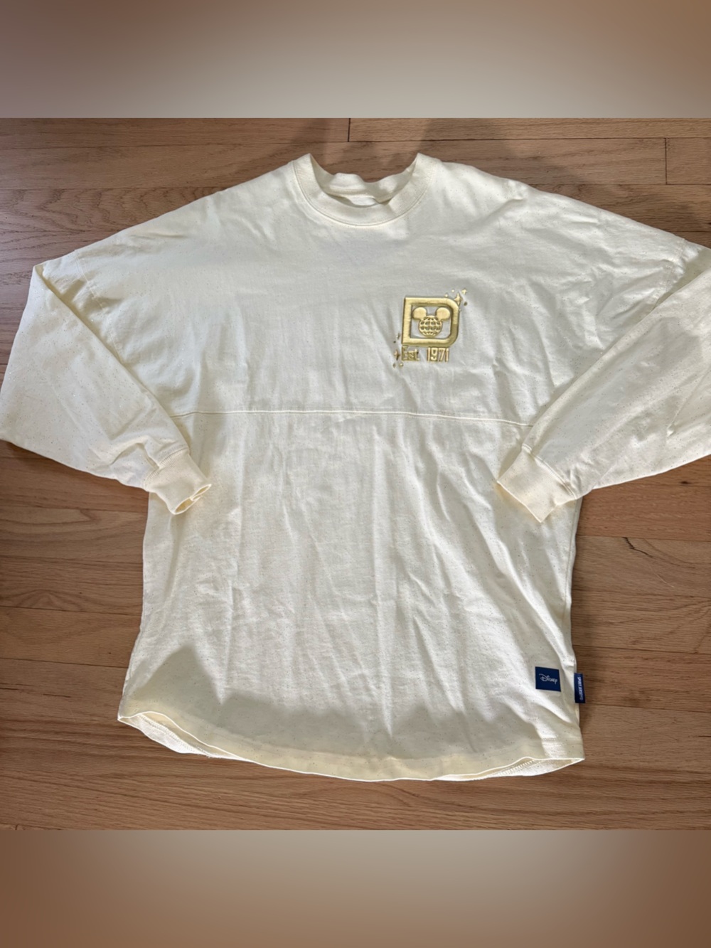 Walt Disney World Cream Colored Gold Pixie Dust Cotton Spirit Jersey Size XS